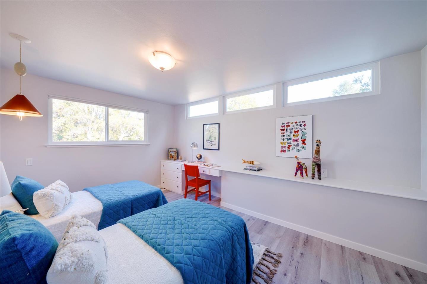 1122 Southdown Road Hillsborough, CA 94010 - Photo 23 of 42 a bedroom with furniture and a window