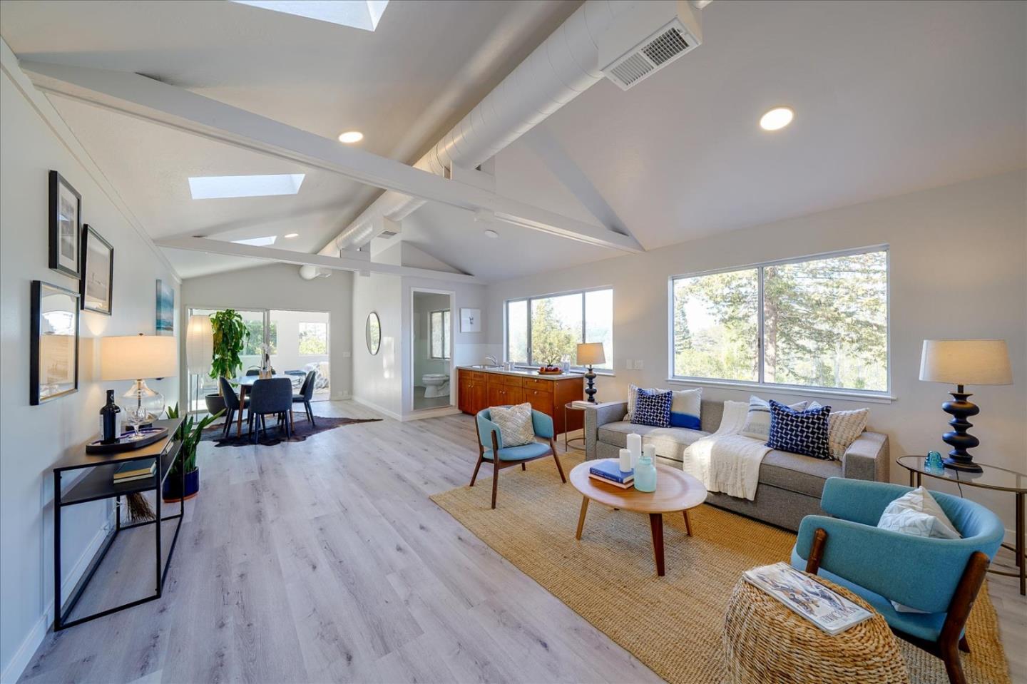 1122 Southdown Road Hillsborough, CA 94010 - Photo 26 of 42 a living room with furniture and a wooden floor