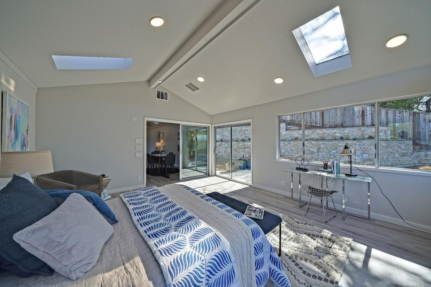 1122 Southdown Road Hillsborough, CA 94010 - Photo 28 of 42 a bed room with a bed and furniture