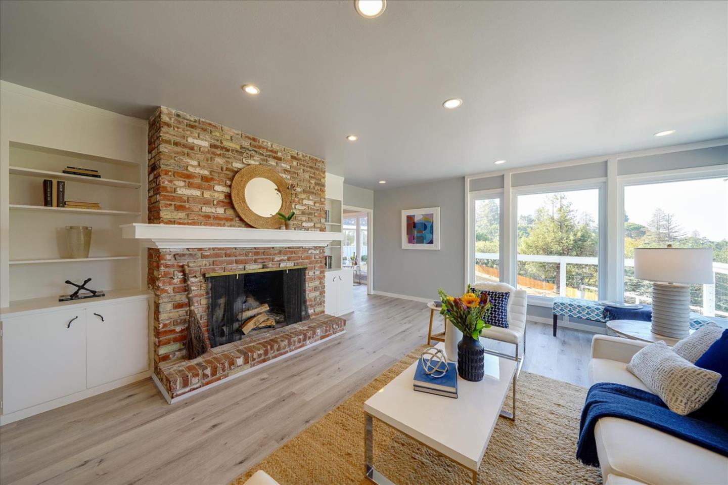1122 Southdown Road Hillsborough, CA 94010 - Photo 3 of 42 a living room with furniture and a fireplace