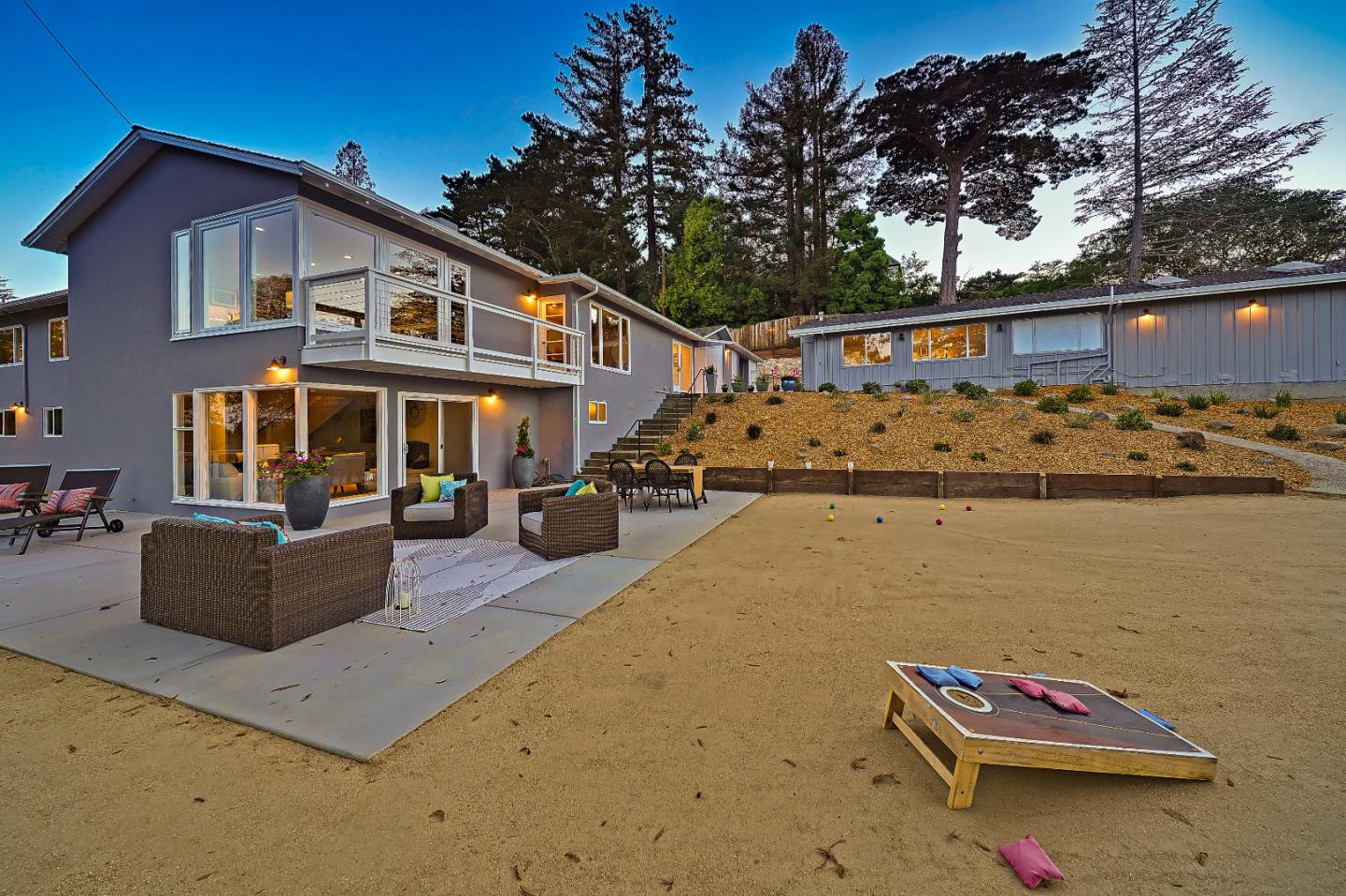 1122 Southdown Road Hillsborough, CA 94010 - Photo 32 of 42 a front view of a house with lake view and a trees