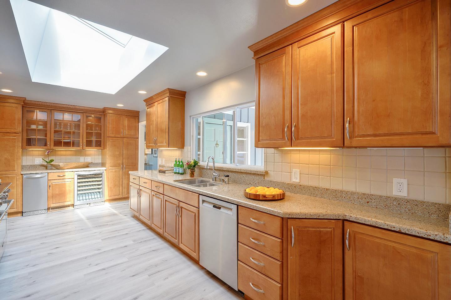 1122 Southdown Road Hillsborough, CA 94010 - Photo 7 of 42 a kitchen with stainless steel appliances granite countertop a sink stove and cabinets