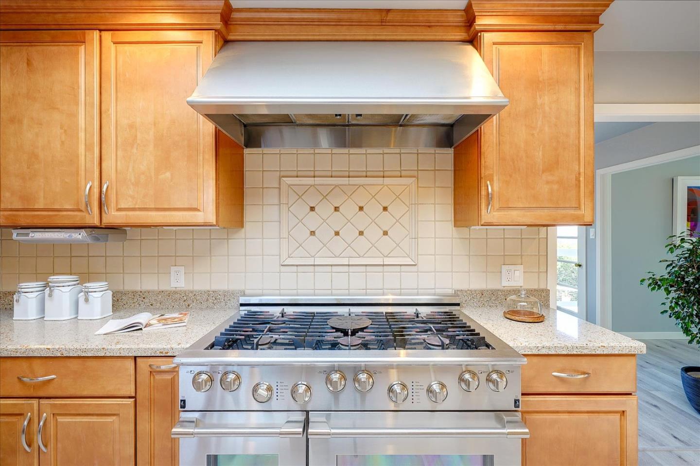 1122 Southdown Road Hillsborough, CA 94010 - Photo 8 of 42 a stove top oven sitting inside of a kitchen
