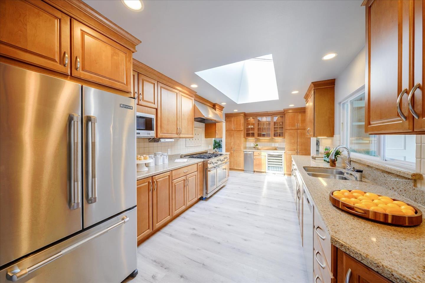1122 Southdown Road Hillsborough, CA 94010 - Photo 9 of 42 a large kitchen with stainless steel appliances granite countertop a refrigerator a oven and a sink