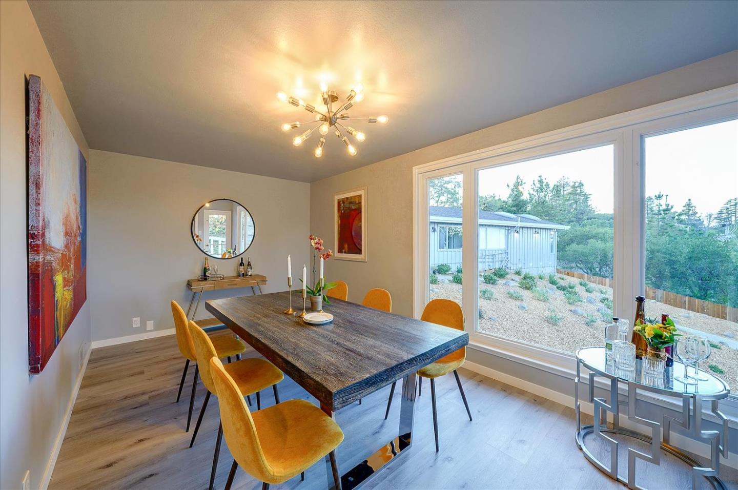 1122 Southdown Road Hillsborough, CA 94010 - Photo 10 of 42 a view of a dining room with furniture window and wooden floor