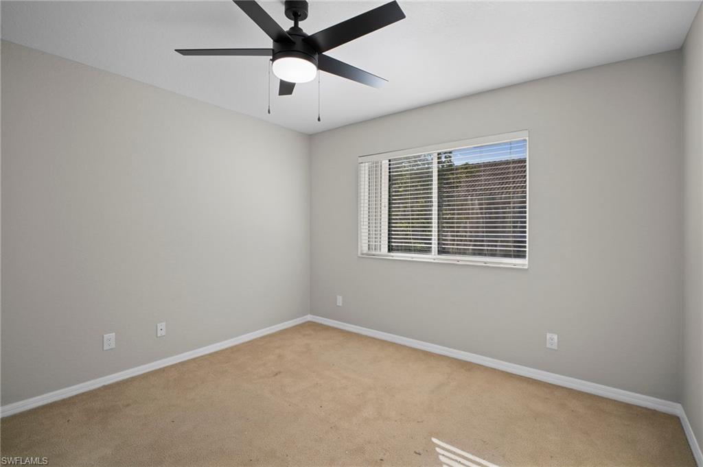 9648 Roundstone Circle Fort Myers, FL 33967 - Photo 14 of 30 an empty room with a window