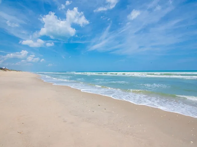 a view of beach and ocean