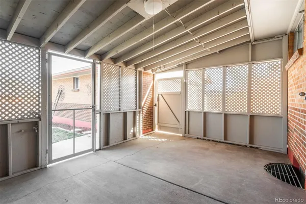 a view of an empty room with a balcony