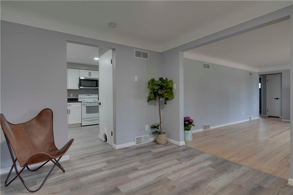 712 Ridge Avenue Pittsburgh, PA 15202 - Photo 5 of 32 a view of a room with furniture and wooden floor
