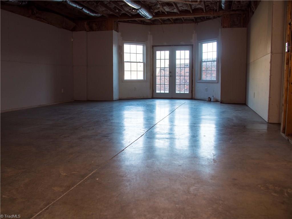 1865 Handy Road Denton, NC 27239 - Photo 24 of 29 Unfinished Basement Playroom