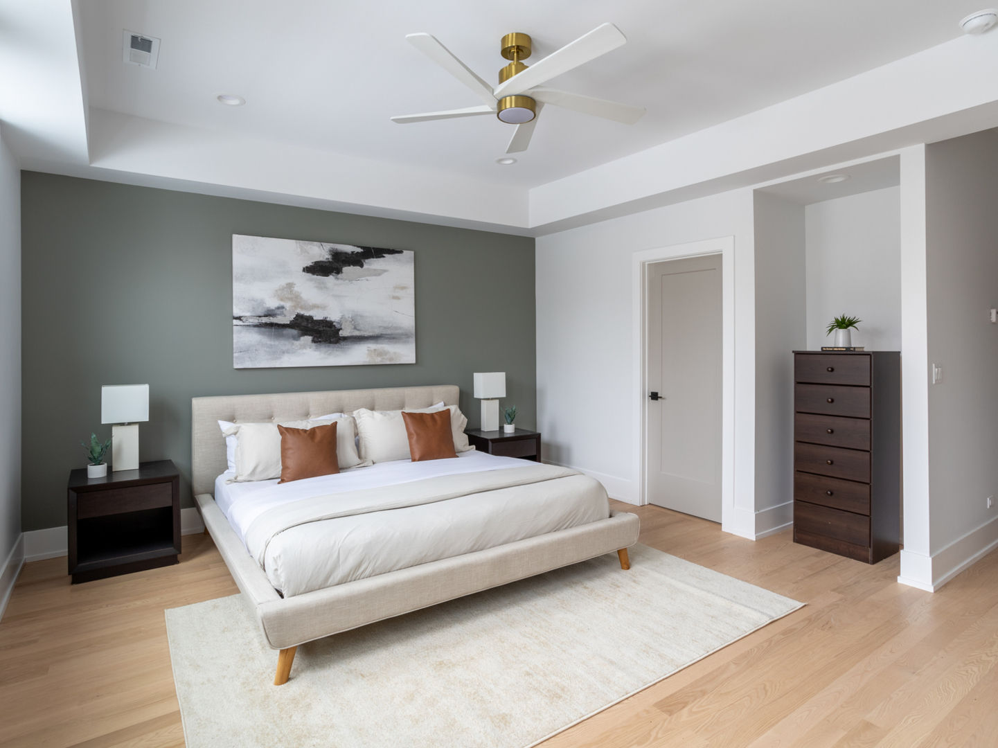 2228 West Lyndale Street Chicago, IL 60647 - Photo 12 of 23 a bedroom with a bed and a chandelier