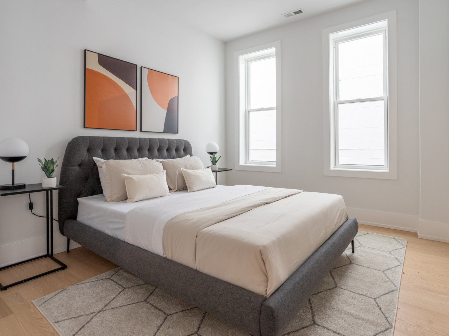 2228 West Lyndale Street Chicago, IL 60647 - Photo 16 of 23 a bedroom with a bed and a window