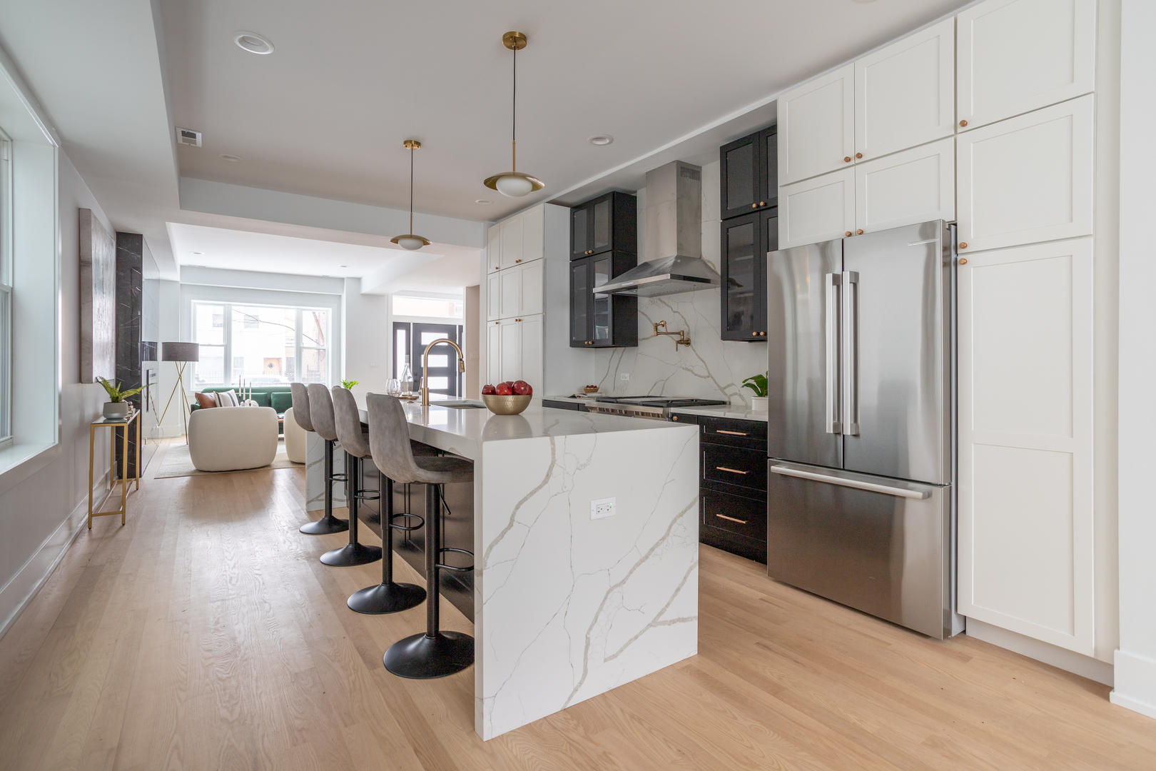 2228 West Lyndale Street Chicago, IL 60647 - Photo 5 of 23 a kitchen with stainless steel appliances granite countertop a refrigerator and a stove top oven