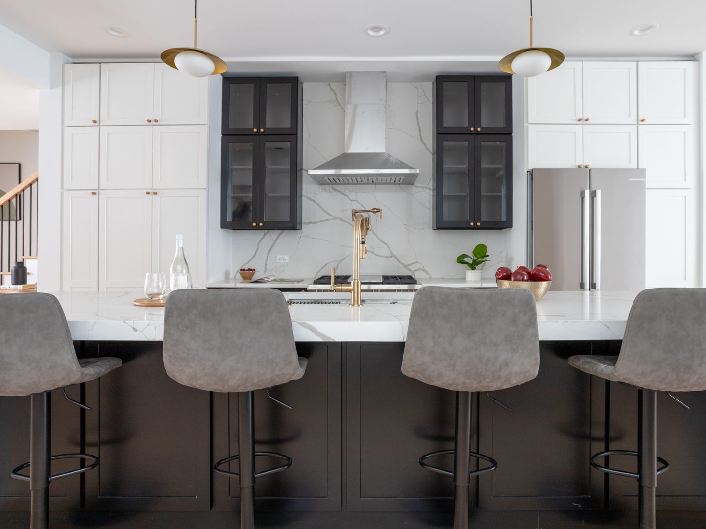 2228 West Lyndale Street Chicago, IL 60647 - Photo 6 of 23 a kitchen with stainless steel appliances granite countertop a table chairs stove and refrigerator