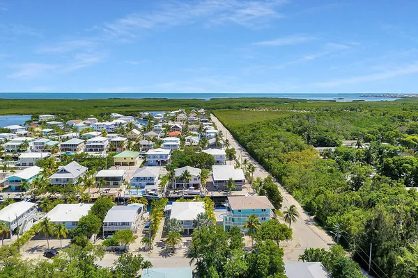 a view of a city with ocean view