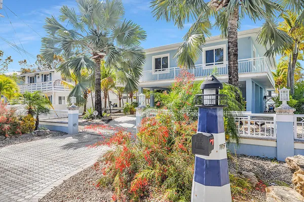 front view of a house with a patio