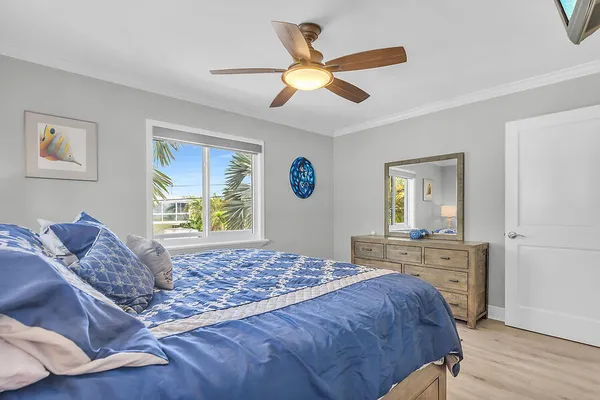 a living room with a bed furniture and a window