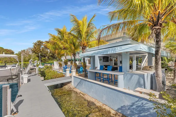 front view of a house with a swimming pool