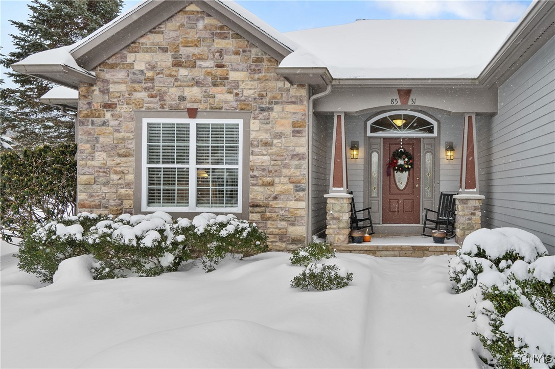 8531 Whisper Ridge Circle Lysander, NY 13027 - Photo 3 of 41 Striking front entrance with stone front