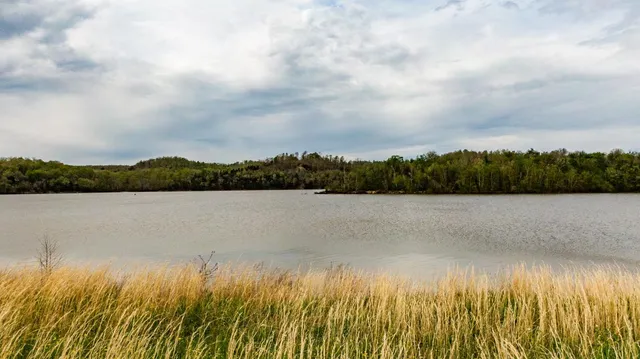 a view of lake with mountain in background