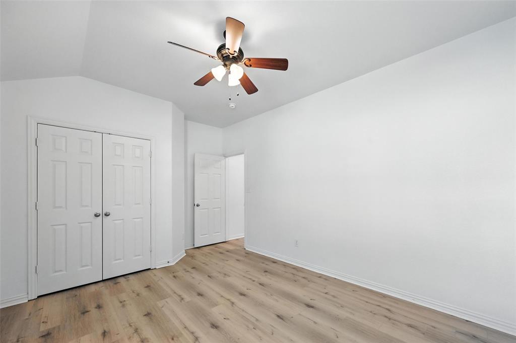 4312 Ridgewood Road Melissa, TX 75454 - Photo 12 of 40 a view of empty room with wooden floor
