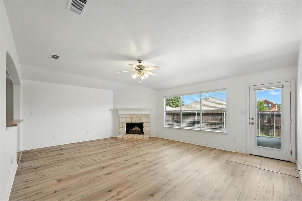 4312 Ridgewood Road Melissa, TX 75454 - Photo 21 of 40 a view of empty room with wooden floor and fan