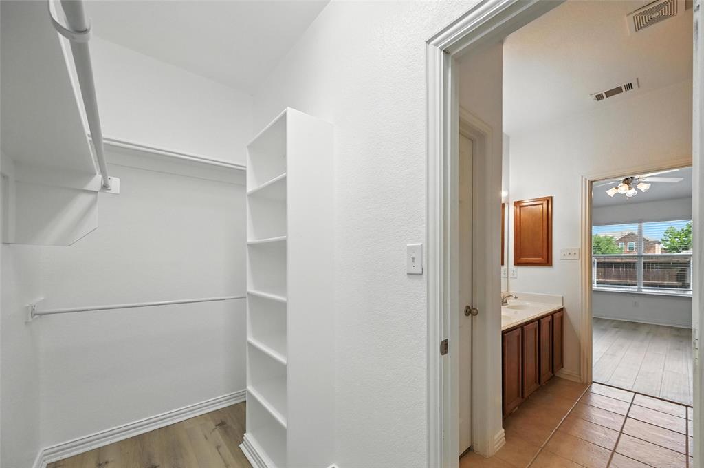 4312 Ridgewood Road Melissa, TX 75454 - Photo 29 of 40 a view of a walk in closet
