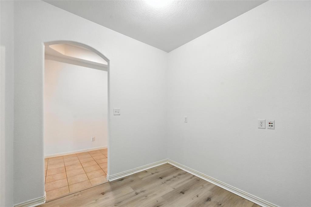 4312 Ridgewood Road Melissa, TX 75454 - Photo 10 of 40 an empty room with wooden floor