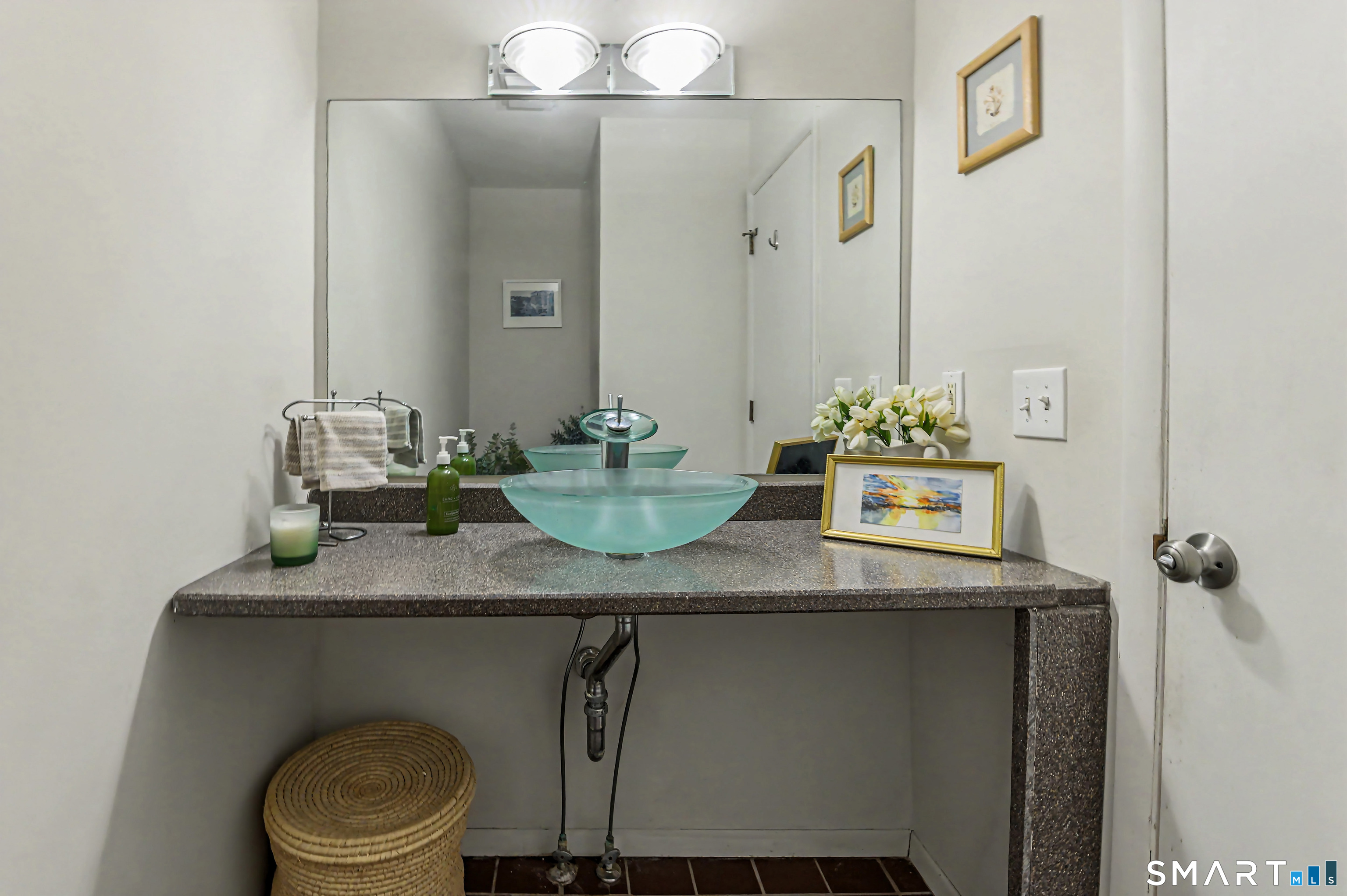 216 Silver Spring Road Wilton, CT 06897 - Photo 16 of 33 a bathroom with a granite countertop sink a toilet and mirror