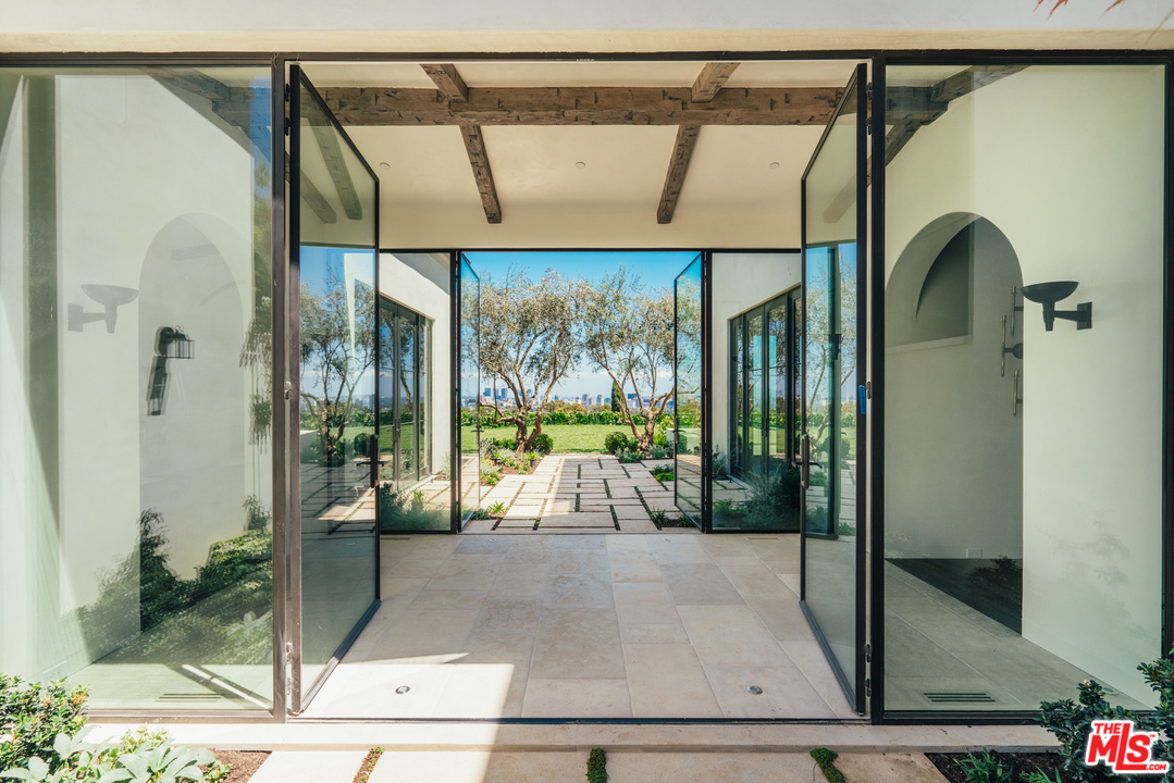 375 Fordyce Road Los Angeles, CA 90049 - Photo 1 of 26 a living room filled with furniture