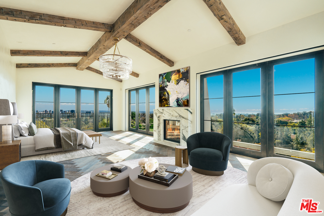 375 Fordyce Road Los Angeles, CA 90049 - Photo 11 of 26 a living room with furniture and a large window