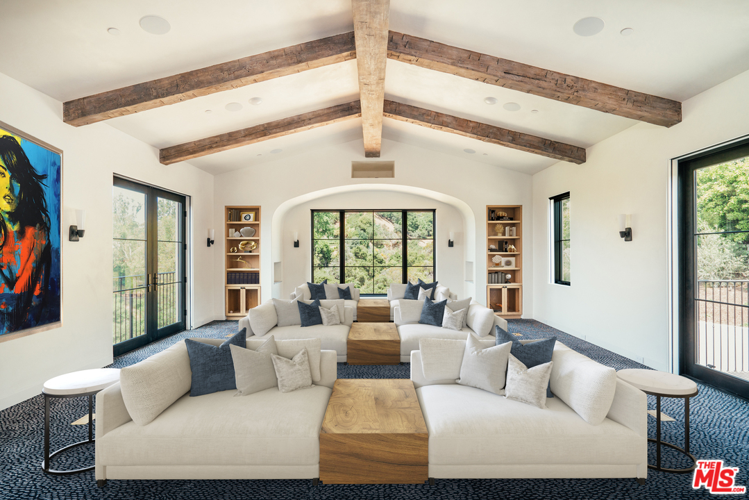 375 Fordyce Road Los Angeles, CA 90049 - Photo 17 of 26 a living room with furniture and a large window