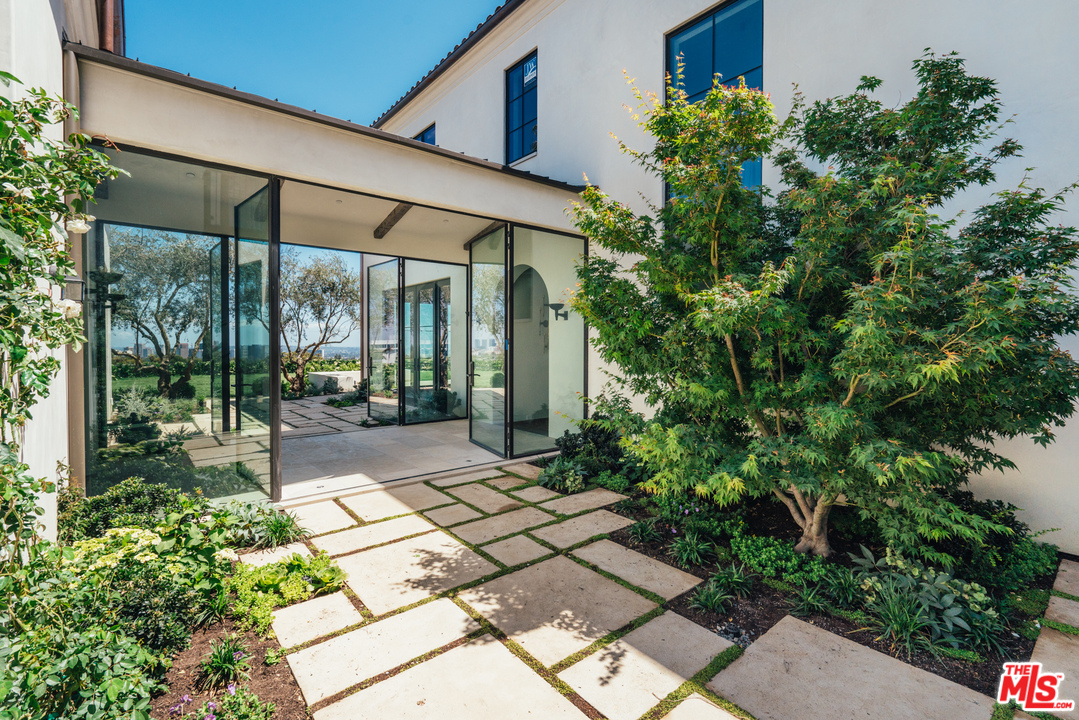 375 Fordyce Road Los Angeles, CA 90049 - Photo 26 of 26 a view of backyard with patio