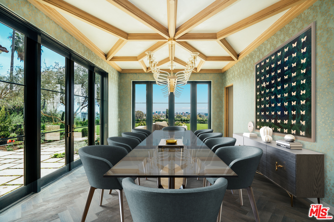 375 Fordyce Road Los Angeles, CA 90049 - Photo 5 of 26 a view of a dining room with furniture wooden floor and chandelier