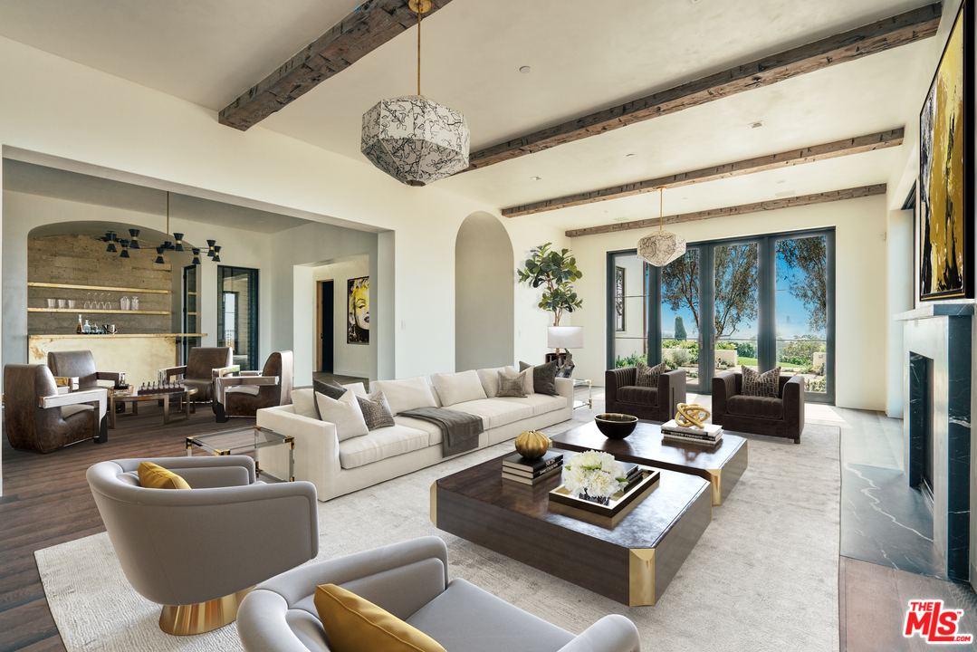 375 Fordyce Road Los Angeles, CA 90049 - Photo 8 of 26 a living room with furniture and a chandelier