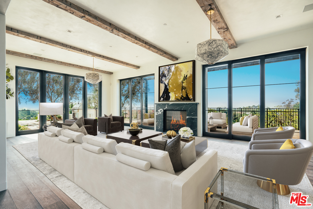 375 Fordyce Road Los Angeles, CA 90049 - Photo 9 of 26 a living room with furniture and a large window