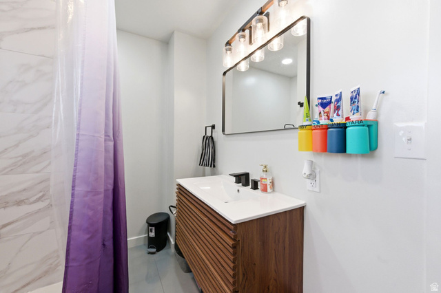 2323 North 720 West Clinton, UT 84015 - Photo 5 of 34 Bathroom with vanity and a shower with curtain