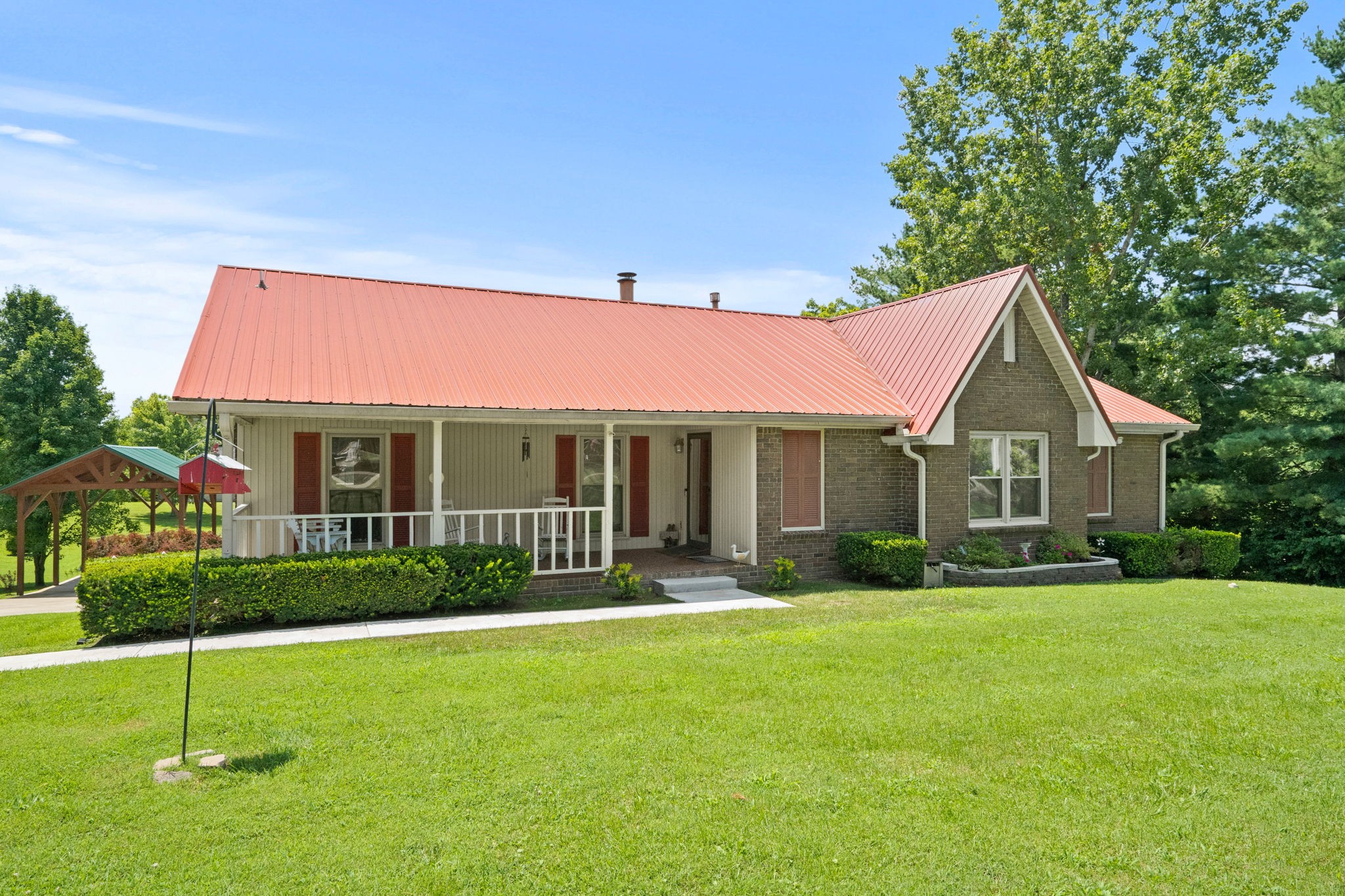 666 Lakeside Drive Springfield, TN 37172 - Photo 16 of 67 a front view of a house with a yard and green space