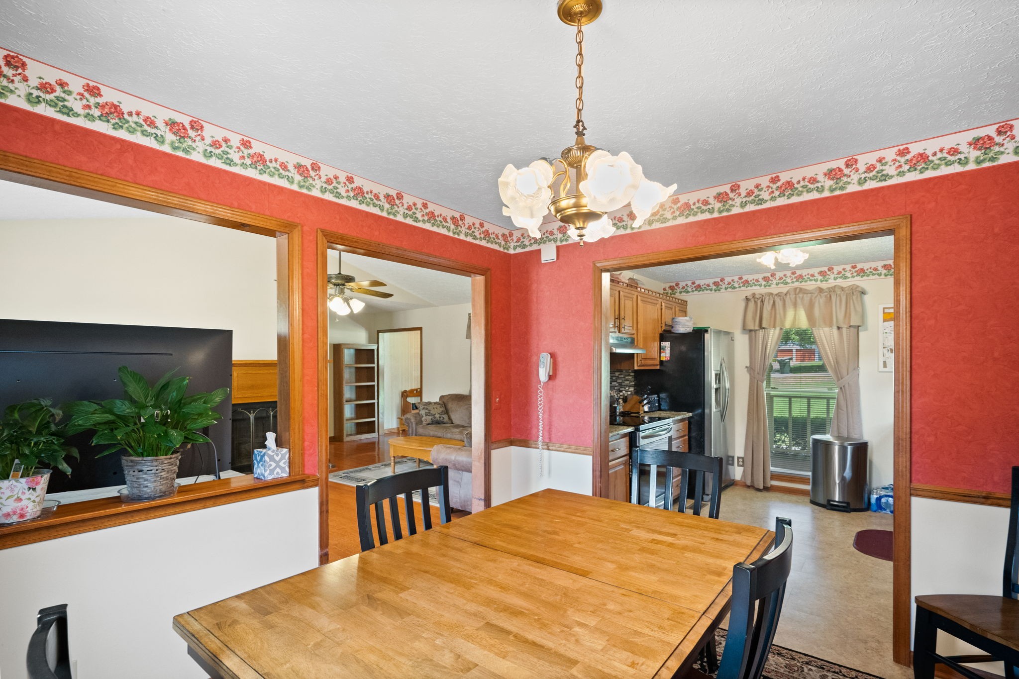 666 Lakeside Drive Springfield, TN 37172 - Photo 27 of 67 a view of a dining room with furniture wooden floor and chandelier