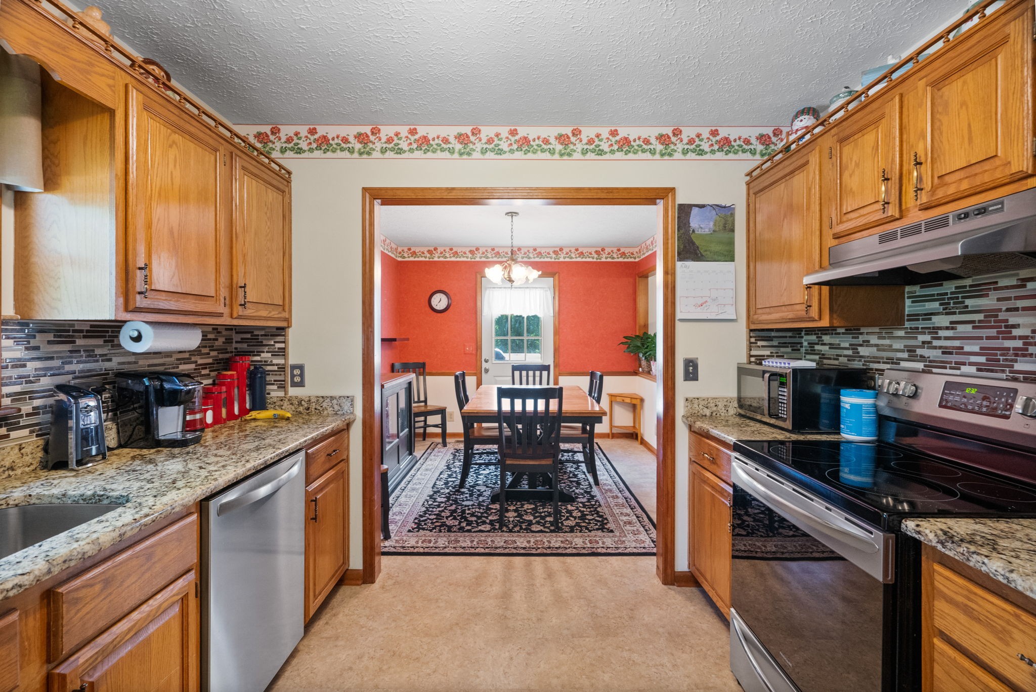 666 Lakeside Drive Springfield, TN 37172 - Photo 31 of 67 a kitchen with stainless steel appliances granite countertop a sink stove and granite counter top