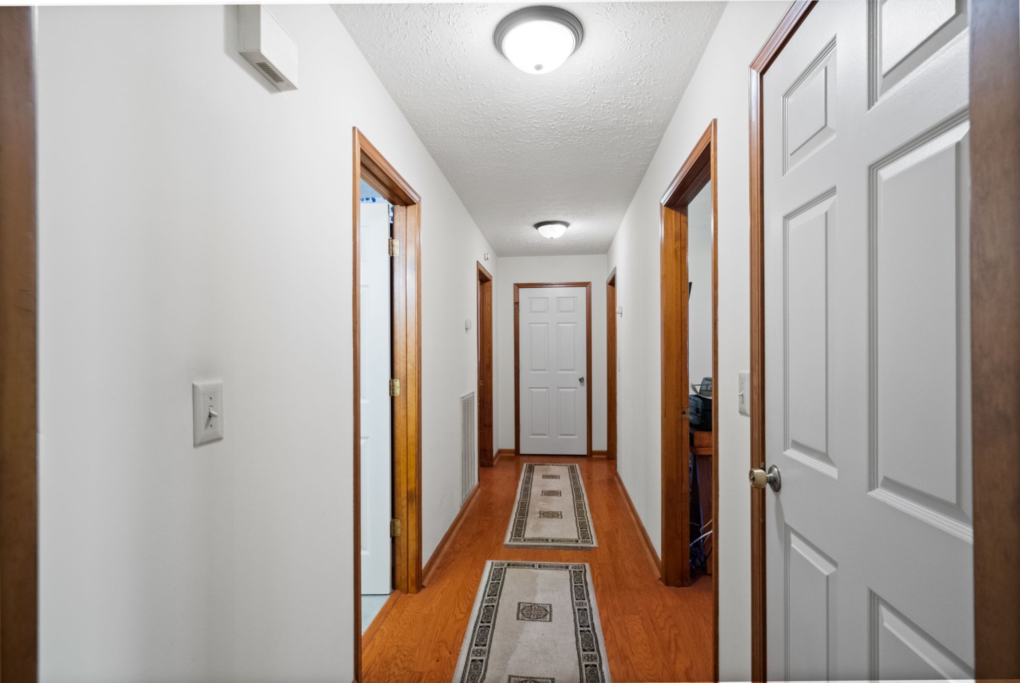 666 Lakeside Drive Springfield, TN 37172 - Photo 32 of 67 a view of a hallway with wooden floor and staircase