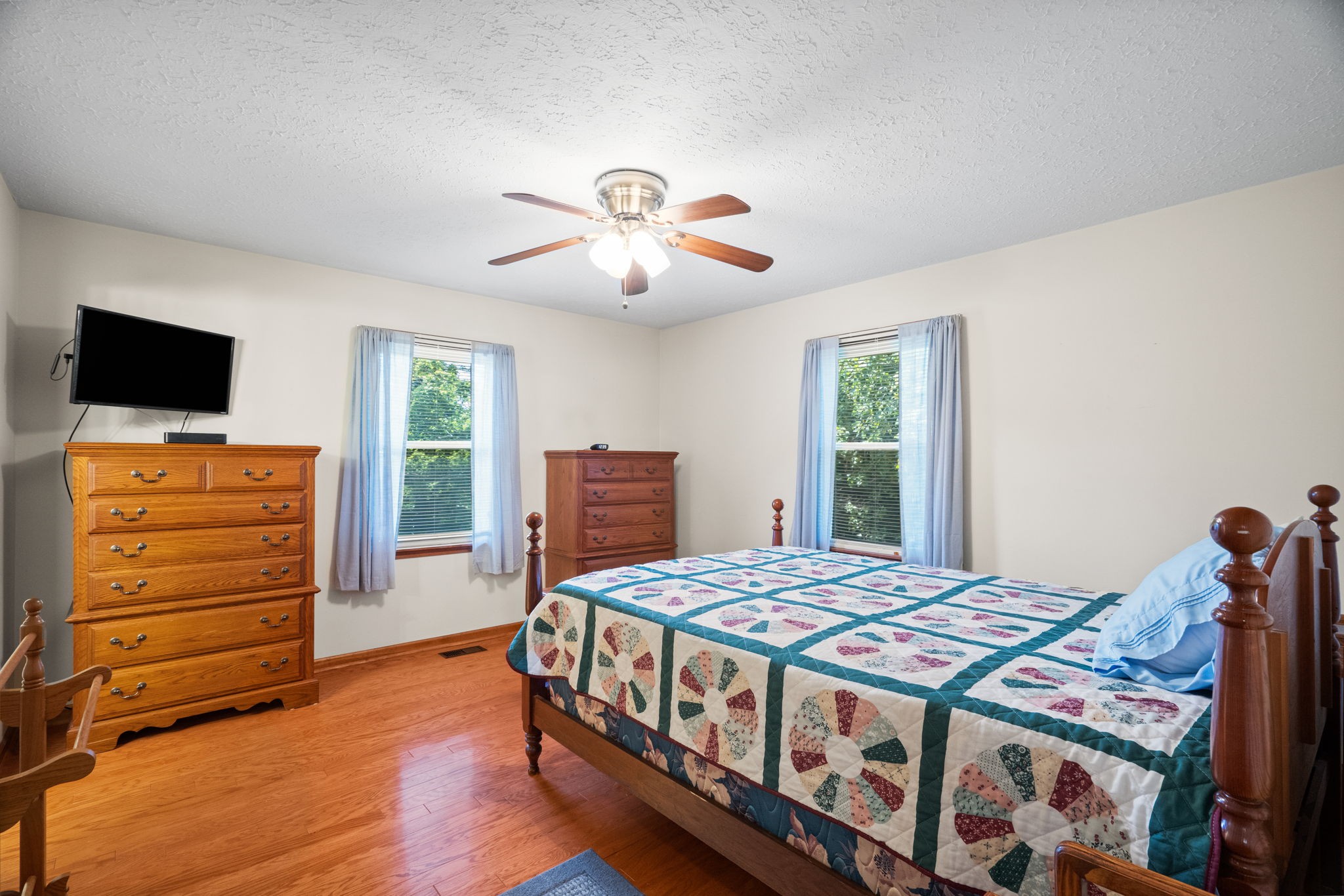 666 Lakeside Drive Springfield, TN 37172 - Photo 38 of 67 a bedroom with a bed and a flat screen tv