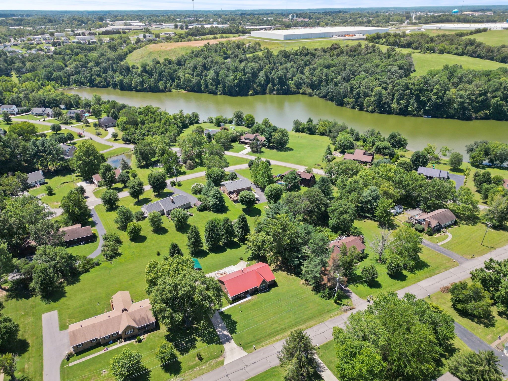 666 Lakeside Drive Springfield, TN 37172 - Photo 6 of 67 a view of a garden with a lake