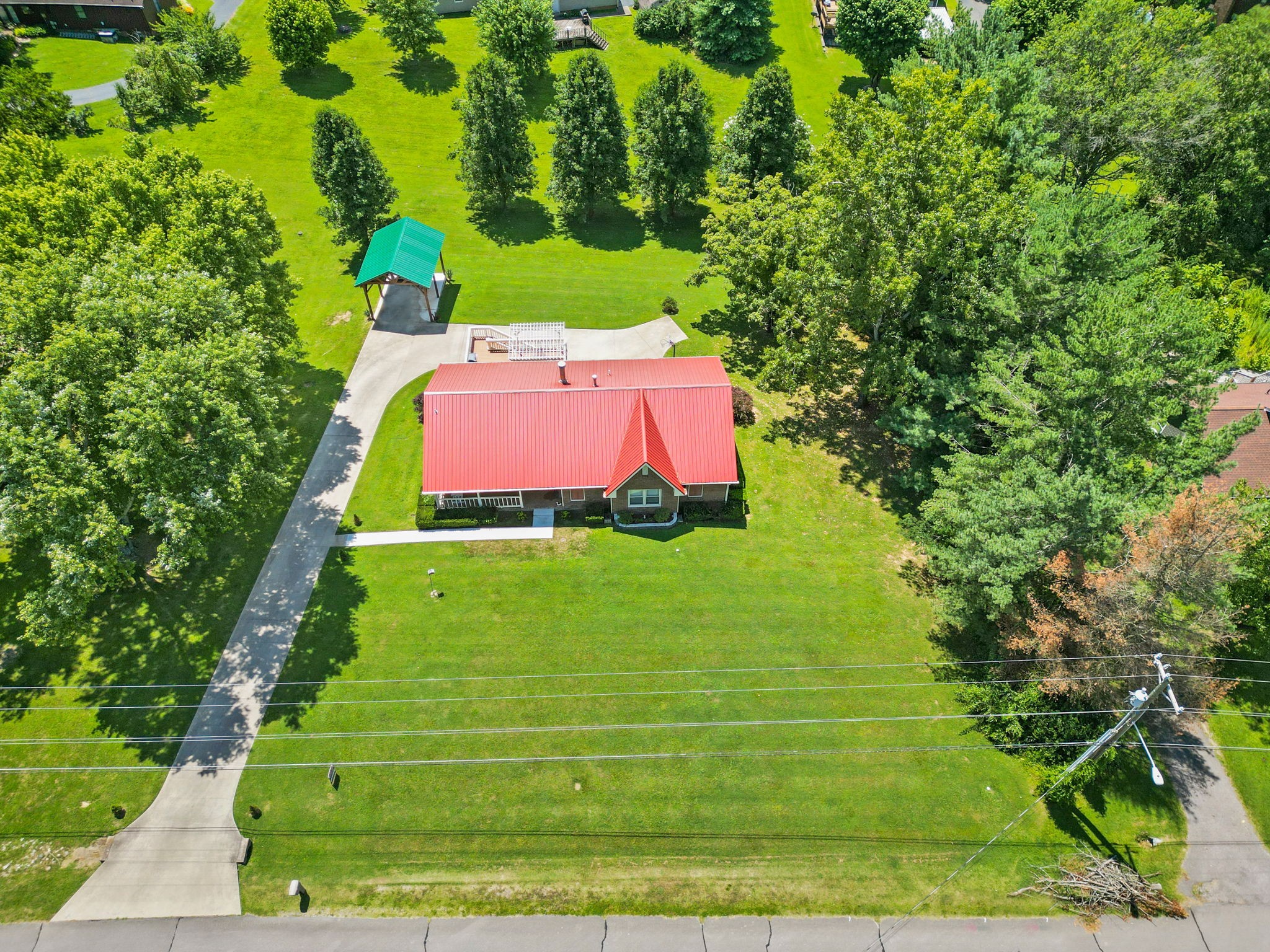 666 Lakeside Drive Springfield, TN 37172 - Photo 66 of 67 a green field with lots of trees