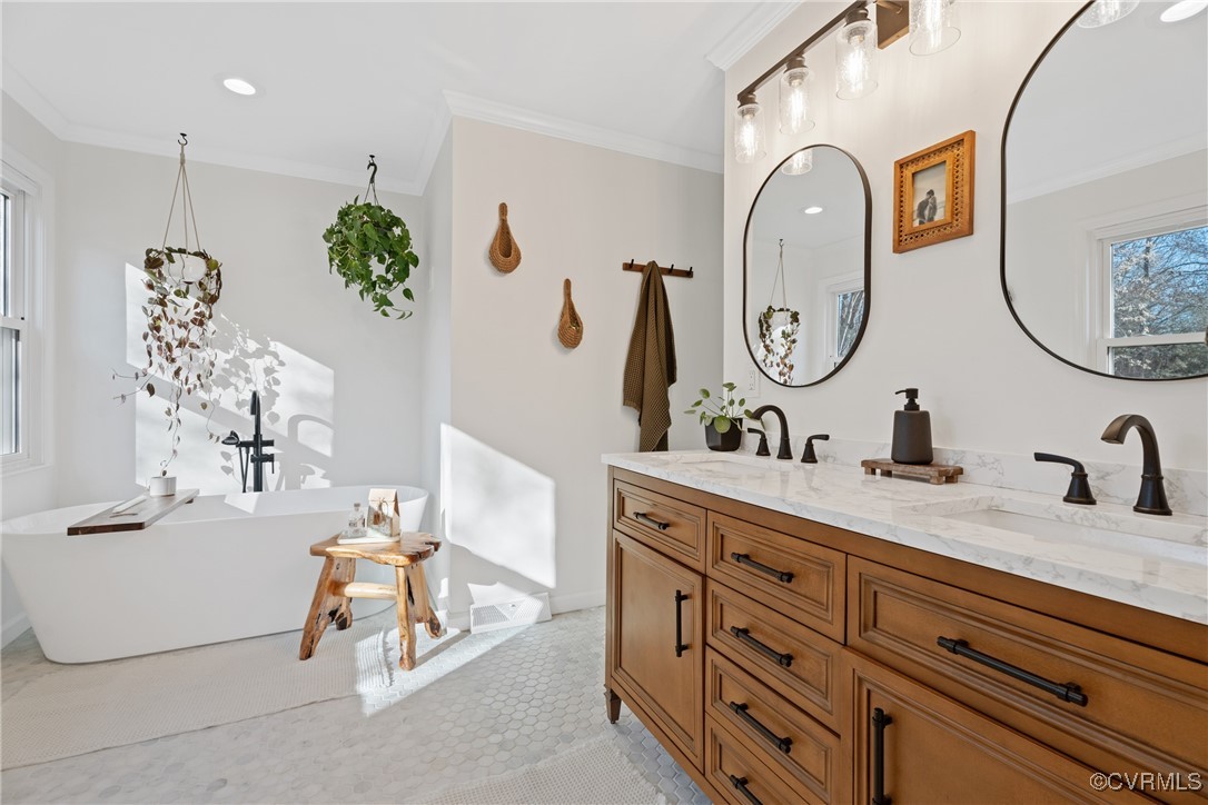 12646 Old Ridge Road Beaverdam, VA 23015 - Photo 17 of 48 Bathroom with crown molding, a tub to relax in, an