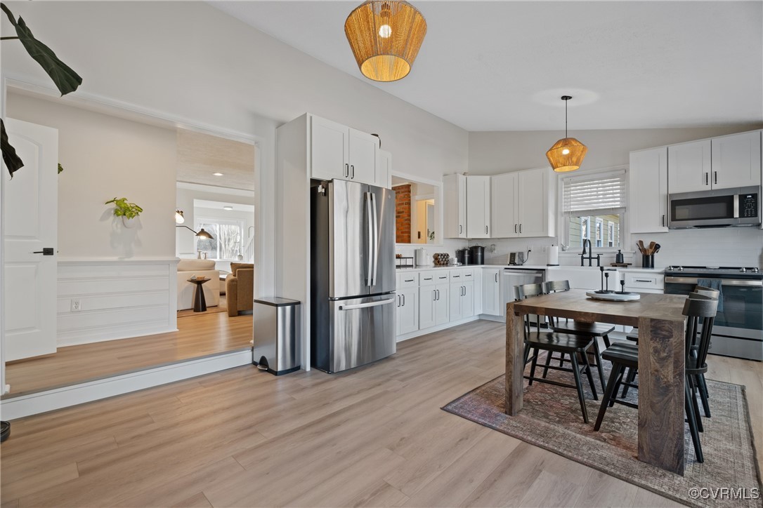 12646 Old Ridge Road Beaverdam, VA 23015 - Photo 10 of 48 Kitchen featuring hanging light fixtures, stainles