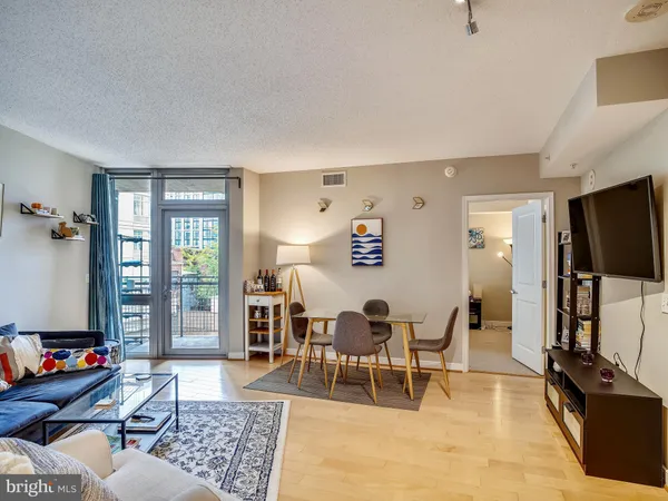 a living room with furniture and a table