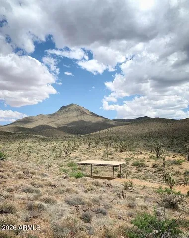 a view of lake with mountain