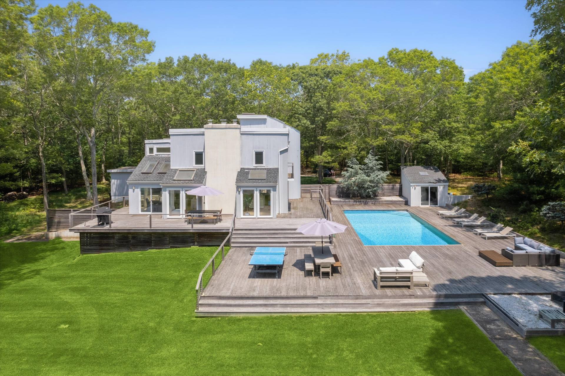 2 Jodys Path East Hampton, NY 11937 - Photo 12 of 43 an aerial view of a house with a garden and swimming pool