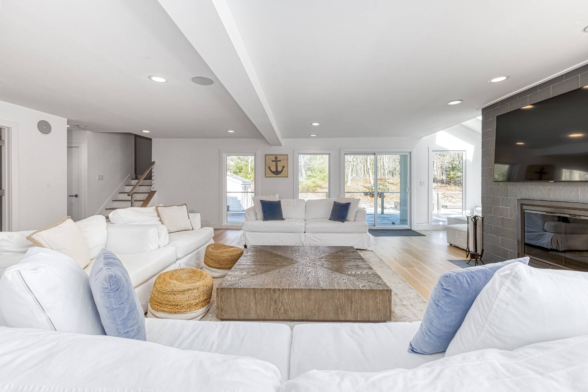 2 Jodys Path East Hampton, NY 11937 - Photo 19 of 43 a living room with fireplace furniture and a flat screen tv